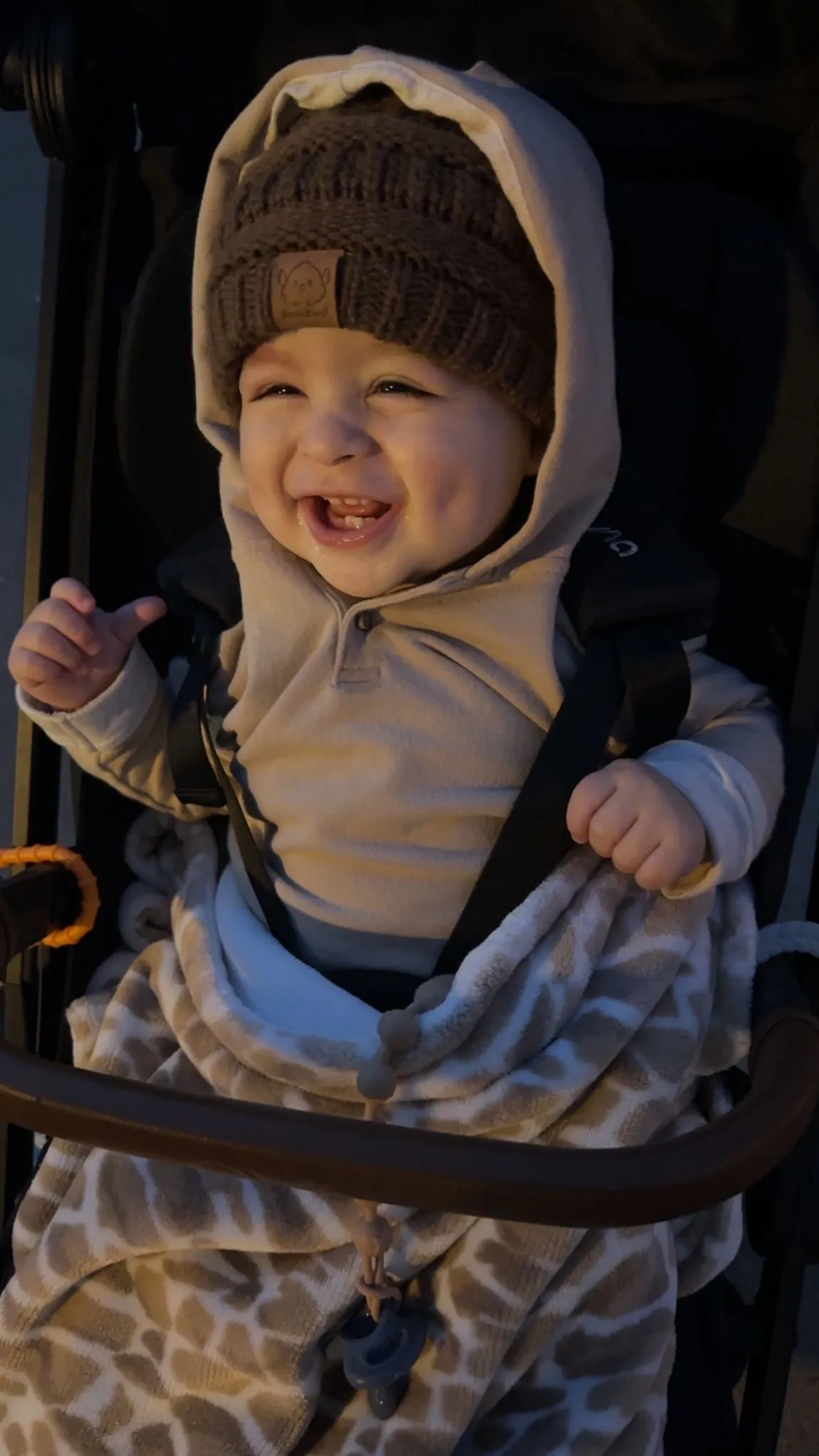 Smiling baby bundled up